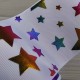 Cinta Gros FOIL 75mm #16 - Rollo 5 metros - Estrellas Multicolor Blanco